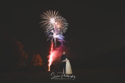 Hogarths stone manor wedding photography bride groom looking up watching fireworks
